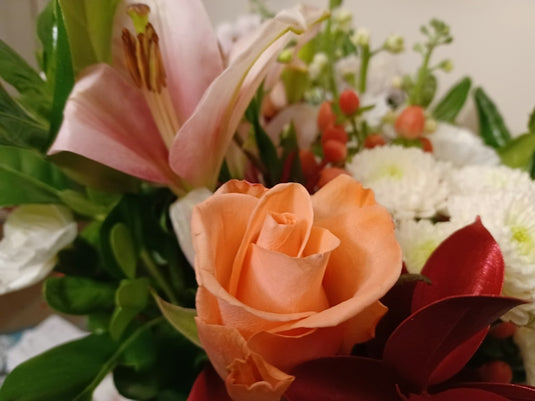 a close up of a bouquet of flowers on a table