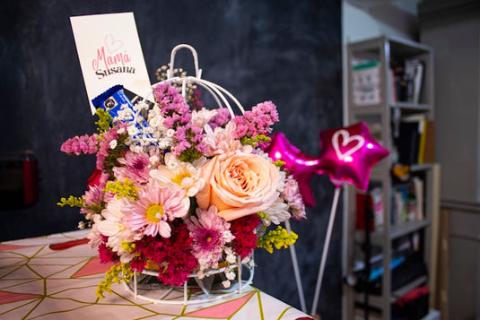a bouquet of flowers on a table in a room