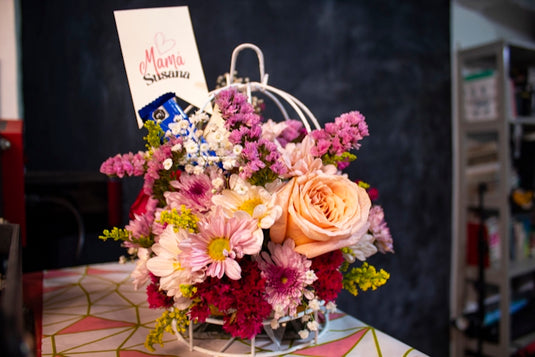 a bouquet of flowers sitting on top of a table