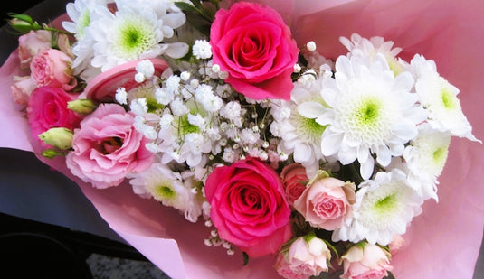 A bouquet of pink and white flowers